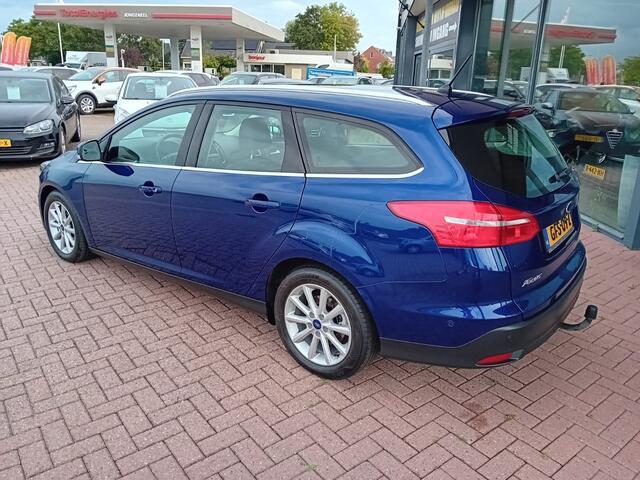 Ford FOCUS Wagon 1.5 Titanium Automaat 150 PK, Airco(automatisch), Multimediasysteem, Carplay/Android auto, Navigatie, Camera, Parkeersensoren, Parkeerhulp, Cruise control, Stoelverwarming, Verwarmd stuurwiel, Verwarmde voorruit, Keyless, Half lederen bekleding, Tre