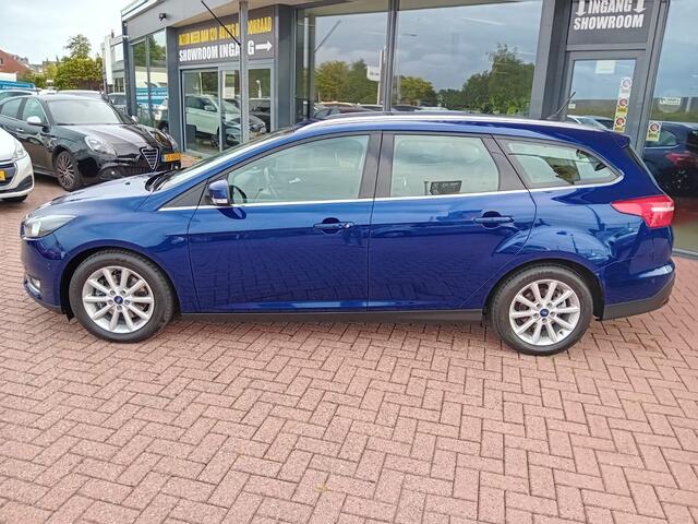 Ford FOCUS Wagon 1.5 Titanium Automaat 150 PK, Airco(automatisch), Multimediasysteem, Carplay/Android auto, Navigatie, Camera, Parkeersensoren, Parkeerhulp, Cruise control, Stoelverwarming, Verwarmd stuurwiel, Verwarmde voorruit, Keyless, Half lederen bekleding, Tre