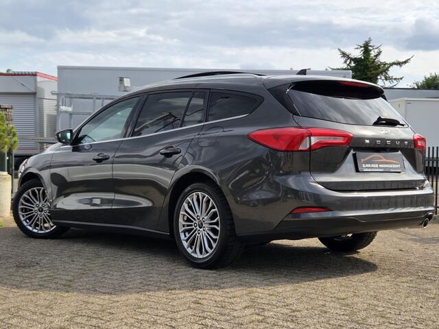 Ford FOCUS Wagon 1.0 EcoBoost Titanium Business PANORAMADAK|NAVIGATIE|CRUISE CONTROL|CAMERA|KEY LESSGO|BANG&OLUFSEN| MUZIEK|PDC VOOR+ACHTER|GETINT GLAS|ELEKTRISCHE KLEP|17 INCH Maandag tot Vrijdag geopend van 09.00 tot 20.00 uur geopend en Zaterdag van 09.00 tot 18.