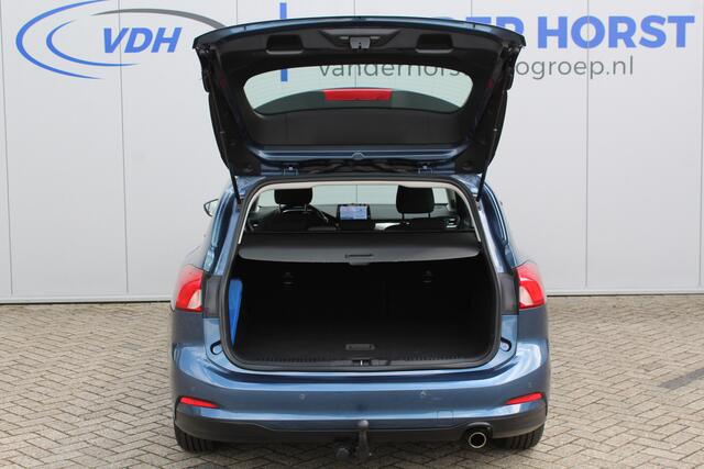 Ford FOCUS Wagon 1.0-125pk EcoBoost Titanium Business. Ruime, zeer geschikte gezinsauto ! Autm. airco dual, stoel-, stuur- en voorraamverw., LM wielen, trekhaak, metallic lak, navigatie, telefoonvoorb., cruise control etc