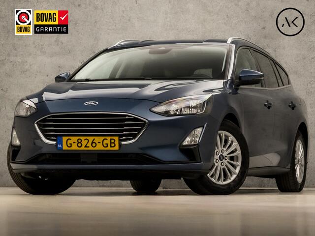 Ford FOCUS Wagon 1.0 EcoBoost Titanium Sport Automaat (APPLE CARPLAY, GROOT NAVI, CAMERA, CLIMATE, TREKHAAK, ADAPTIVE CRUISE, SPORTSTOELEN, GETINT GLAS, LM VELGEN, NIEUWSTAAT)