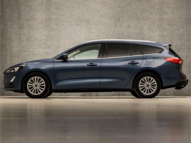 Ford FOCUS Wagon 1.0 EcoBoost Titanium Sport Automaat (APPLE CARPLAY, GROOT NAVI, CAMERA, CLIMATE, TREKHAAK, ADAPTIVE CRUISE, SPORTSTOELEN, GETINT GLAS, LM VELGEN, NIEUWSTAAT)