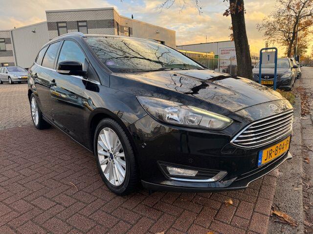 Ford FOCUS Wagon 1.0 Titanium Airco/ECC,Cruisecontrol,Navigatie
