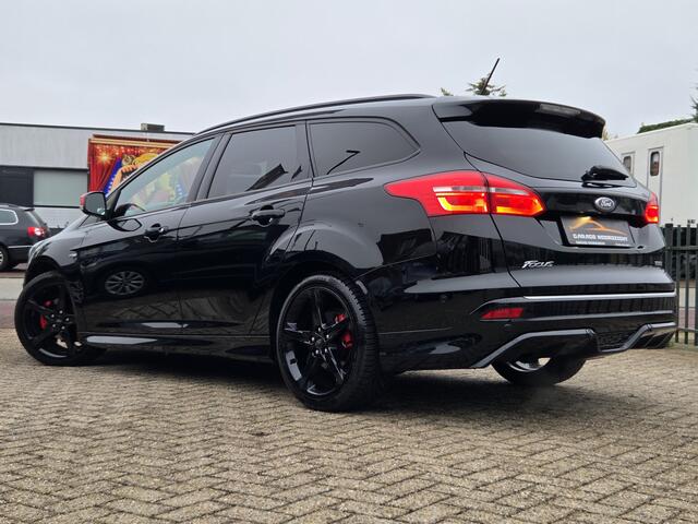 Ford FOCUS Wagon 1.0 ST-Line NAVIGATIE|BLUE TOOTH MEDIA|ECC/AIRCO|STOELVERWARMING&STUUR|BLUE TOOTH TELEFONIE|PDC VOOR&ACHTER|18 INCH|DEALER ONDERHOUDEN Maandag tot Vrijdag geopend van 09.00 tot 20.00 uur en Zaterdag van 09.00 tot 18.00 uur