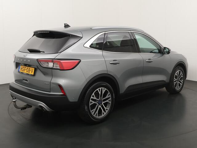 Ford KUGA 2.5 PHEV 225 pk Titanium | Trekhaak | Winter Pack | Adapt. cruise | Camera's | 18" | Navi | Clima