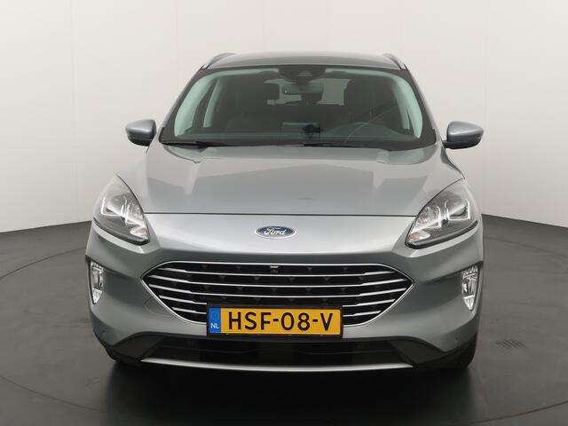 Ford KUGA 2.5 PHEV 225 pk Titanium | Trekhaak | Winter Pack | Adapt. cruise | Camera's | 18" | Navi | Clima