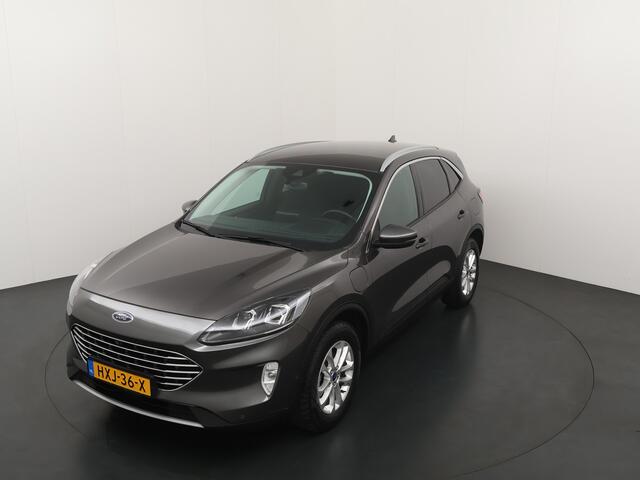 Ford KUGA 2.5 PHEV 225 pk Titanium | Winter Pack | El. a. klep | Adapt. cruise | Adapt. LED | 4 seiz. banden