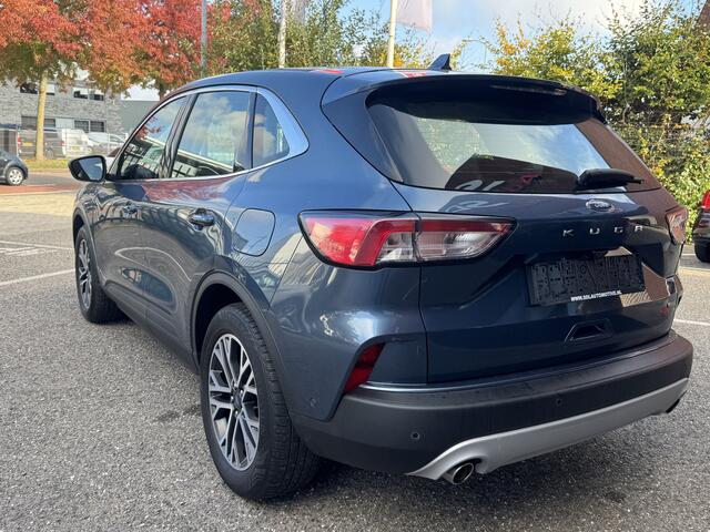 Ford KUGA 2.5 PHEV Titanium // CAMERA+SENSOREN // DODEHOEK // ADAPTIVE CRUISE // NAVI+CARPLAY // STOEL VERWARMING //