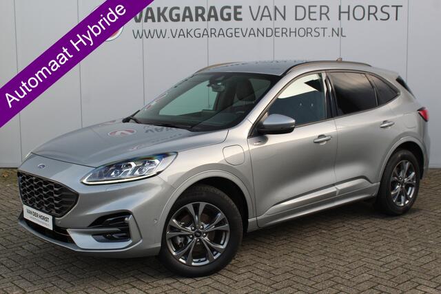 Ford KUGA 2.5 PHEV ST-Line X. Hybride rijden voor een reële prijs ! Android/Apple carplay, LED dagrijverlichting, Parkeersensoren, Climate control, Navigatie, Cruise Control, Bluetooth, Navigatie, Camera v+a, Metallic lak etc