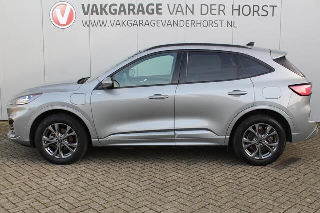 Ford KUGA 2.5 PHEV ST-Line X. Hybride rijden voor een reële prijs ! Android/Apple carplay, LED dagrijverlichting, Parkeersensoren, Climate control, Navigatie, Cruise Control, Bluetooth, Navigatie, Camera v+a, Metallic lak etc