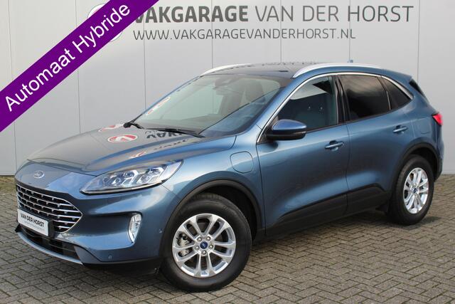 Ford KUGA 2.5-225pk PHEV Titanium X. Hybride rijden voor een reële prijs ! Stoel-, stuur- en voorraamverw., Adapt. cruise control, Side- en lane assist, B&O soundsyst., Trekhaak afneemb. kogel, Climate control, Navigatie,, Bluetooth, Elektr. achterkle