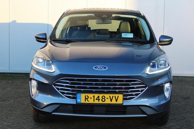 Ford KUGA 2.5-225pk PHEV Titanium X. Luxe hybride rijden voor een reëel bedrag ! Autm. airco, stoel-, stuur- en voorraamverw., elektr. panoramadak, navigatie, telefoonvoorb., camera v+a, elektr. trekhaak, elektr. achterklep, adaptieve cruise cntrl etc.