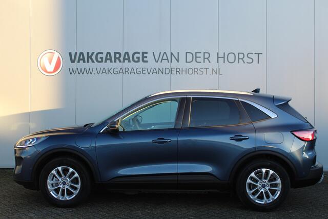 Ford KUGA 2.5-225pk PHEV Titanium X. Luxe hybride rijden voor een reëel bedrag ! Autm. airco, stoel-, stuur- en voorraamverw., elektr. panoramadak, navigatie, telefoonvoorb., camera v+a, elektr. trekhaak, elektr. achterklep, adaptieve cruise cntrl etc.