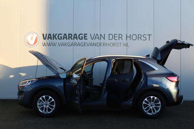 Ford KUGA 2.5-225pk PHEV Titanium X. Luxe hybride rijden voor een reëel bedrag ! Autm. airco, stoel-, stuur- en voorraamverw., elektr. panoramadak, navigatie, telefoonvoorb., camera v+a, elektr. trekhaak, elektr. achterklep, adaptieve cruise cntrl etc.