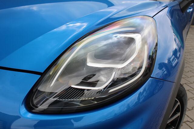 Ford PUMA 1.0 EcoBoost Titanium | Incl. 12 maanden garantie | Trekhaak | Dodehoek detectie | Cruise control | Apple Carplay/Android auto | Lichtmetalen velgen | Elektrische kofferklep | DAB | Airco | Climate control | Navigatie