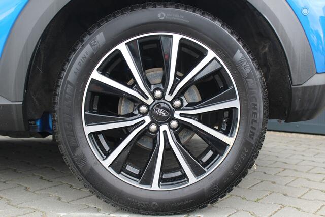 Ford PUMA 1.0 EcoBoost Titanium | Incl. 12 maanden garantie | Trekhaak | Dodehoek detectie | Cruise control | Apple Carplay/Android auto | Lichtmetalen velgen | Elektrische kofferklep | DAB | Airco | Climate control | Navigatie