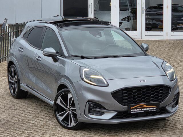 Ford PUMA 1.0 EcoBoost ST-Line X PANORAMADAK|NAVIGATIE|CAMERA|CRUISE CONTROL|HALF/LEDER|ECC/AIRCO|PDC VOOR&ACHTER|STOELVERWARMING&STUUR|19 INCH|DEALERE ONDERHOUDEN Maandag tot Vrijdag geopend van 09.00 tot 20.00 uur en Zaterdag van 09.00 tot 18.00 uur