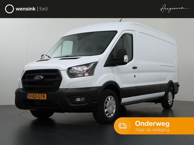 Ford TRANSIT 350 2.0 TDCI L3 H2 Trend | Navigatie | Stoelverwarming | Trekhaak 2500 KG AHW | Airco | 3-Zits | NIEUW | Carplay - Android Auto | Laadruimte Pakket | Cruise Control | Multifuntioneel Stuurwiel
