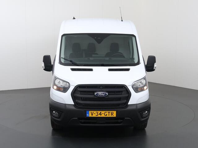 Ford TRANSIT 350 | 2.0 TDCI | L3 H2 | TREND | TREKHAAK 2500 KG AHW | CLIMATE CONTROL | NAVIGATIE | PARKEERSENSOREN V+A | CRUISE CONTROL | BIJRIJDERSBANK | LAADRUIMTE PAKKET | APPLE CARPLAY / ANDROID AUTO | STOEVERWARMING