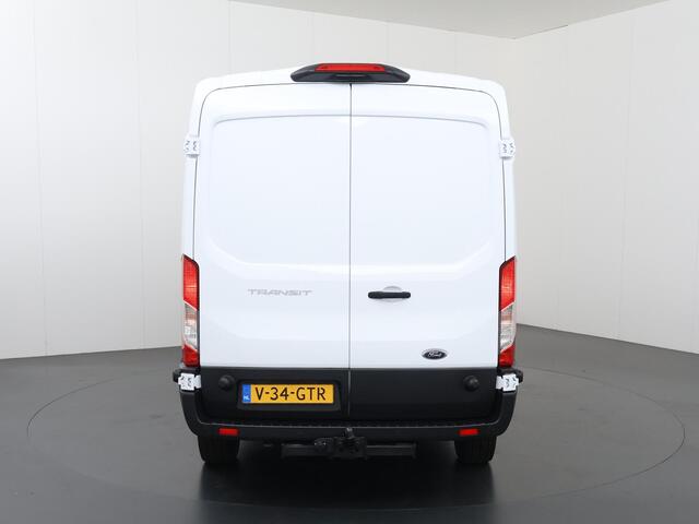 Ford TRANSIT 350 | 2.0 TDCI | L3 H2 | TREND | TREKHAAK 2500 KG AHW | CLIMATE CONTROL | NAVIGATIE | PARKEERSENSOREN V+A | CRUISE CONTROL | BIJRIJDERSBANK | LAADRUIMTE PAKKET | APPLE CARPLAY / ANDROID AUTO | STOEVERWARMING