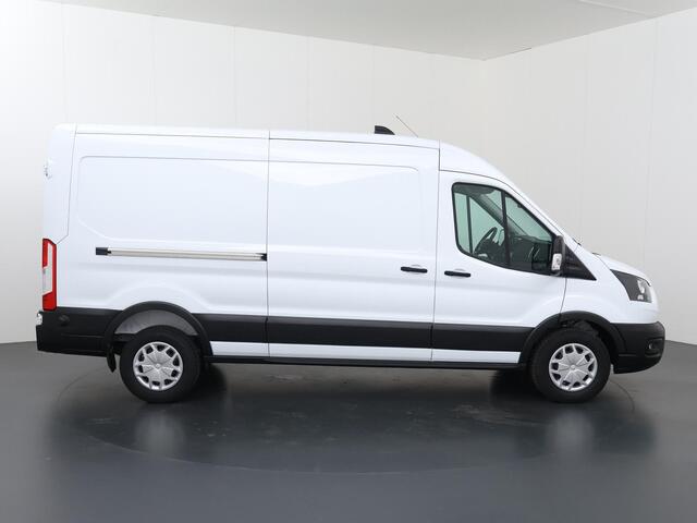 Ford TRANSIT 350 | 2.0 TDCI | L3 H2 | TREND | TREKHAAK 2500 KG AHW | CLIMATE CONTROL | NAVIGATIE | PARKEERSENSOREN V+A | CRUISE CONTROL | BIJRIJDERSBANK | LAADRUIMTE PAKKET | APPLE CARPLAY / ANDROID AUTO | STOEVERWARMING