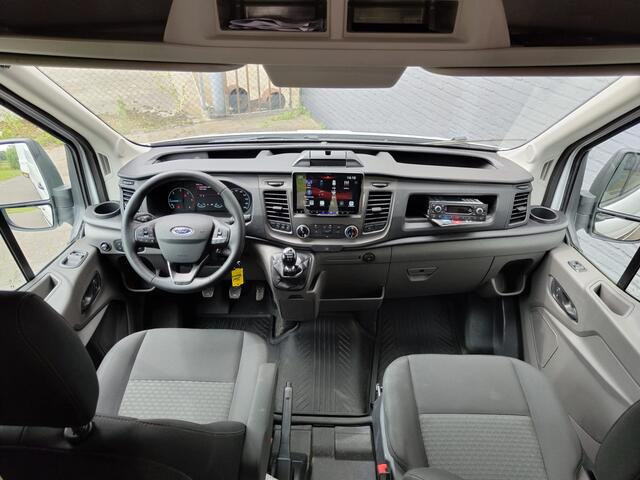 Ford TRANSIT 2.0TDCI 130pk 350 L4H3 Navi Camera Pdc Apple Carplay Android WiFi Airco Cruise Control Voorruit-Verwarmd Regensensor DAB Schuifdeur Betonplex Vloer Wandbetimmering Roll Stability Control Led Spoorwisselassist Euro 6 Zeer Compleet!