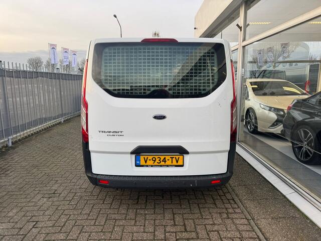 Ford TRANSIT CUSTOM 290 2.2 TDCI L2H1 Ambiente | 1e eigenaar | Zijschuifdeur-rechts | 3-zitplaatsen | Airco | Elektrische ramen | APK t/m 30-10-2025 |