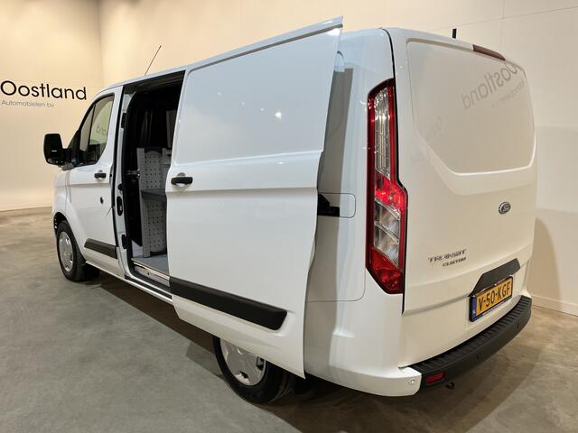 Ford TRANSIT CUSTOM 300 2.0 TDCI L1H1 Trend 130 PK / Servicebus / Bott Inrichting / Euro 6 / Schuifdeur L + R / Airco / CarPlay / Klep / PDC / Navigatie / 3-Zits