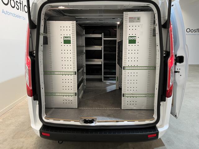 Ford TRANSIT CUSTOM 300 2.0 TDCI L1H1 Trend 130 PK / Servicebus / Bott Inrichting / Euro 6 / Schuifdeur L + R / Airco / CarPlay / Klep / PDC / Navigatie / 3-Zits