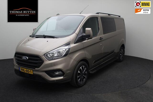 Ford TRANSIT CUSTOM 320 2.0 TDCI L2H1 Limited DC Dubbel Cabine 2020 1e eigenaar | Navigatie | Carplay | Cruise control | Airco | Trekhaak | Bluetooth | PDC | Lichtmetaal | Voorruitverwarming | Stoelverwarming |
