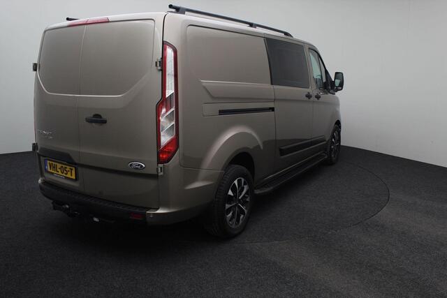 Ford TRANSIT CUSTOM 320 2.0 TDCI L2H1 Limited DC Dubbel Cabine 2020 1e eigenaar | Navigatie | Carplay | Cruise control | Airco | Trekhaak | Bluetooth | PDC | Lichtmetaal | Voorruitverwarming | Stoelverwarming |