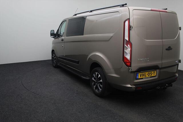 Ford TRANSIT CUSTOM 320 2.0 TDCI L2H1 Limited DC Dubbel Cabine 2020 1e eigenaar | Navigatie | Carplay | Cruise control | Airco | Trekhaak | Bluetooth | PDC | Lichtmetaal | Voorruitverwarming | Stoelverwarming |
