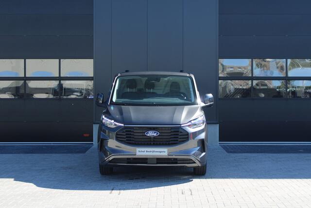 Ford TRANSIT CUSTOM 320 2.0 TDCI L2H1 Limited 150pk - 2x Schuifdeur - Adaptive Cruise - Verwarmd stuur - Blind spot - Navigatie - Camera - Draadloos laden - Rijklaar