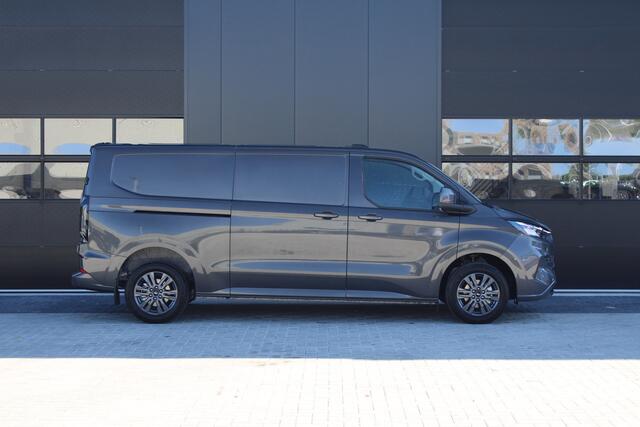 Ford TRANSIT CUSTOM 320 2.0 TDCI L2H1 Limited 150pk - 2x Schuifdeur - Adaptive Cruise - Verwarmd stuur - Blind spot - Navigatie - Camera - Draadloos laden - Rijklaar