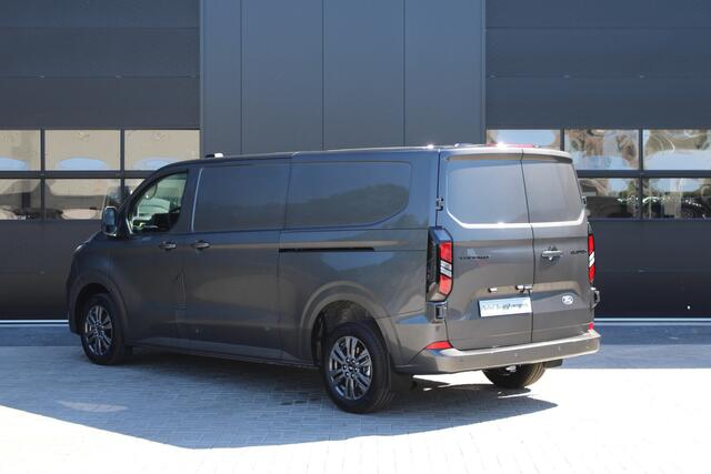 Ford TRANSIT CUSTOM 320 2.0 TDCI L2H1 Limited 150pk - 2x Schuifdeur - Adaptive Cruise - Verwarmd stuur - Blind spot - Navigatie - Camera - Draadloos laden - Rijklaar