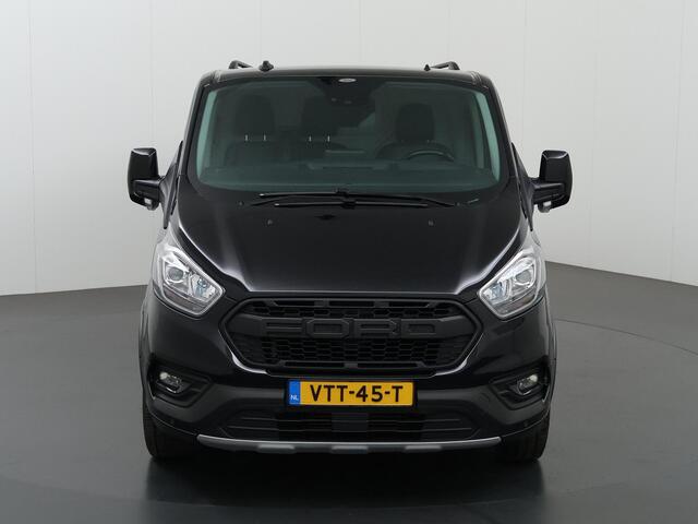 Ford TRANSIT CUSTOM 300 2.0 TDCI L2 H1 | TRAIL UITVOERING | LEDEREN BEKLEDING | NAVIGATIE | CAMERA | CRUISE CONTROL | TREKHAAK | LM VELGEN | TREEPLANKEN | NL AUTO