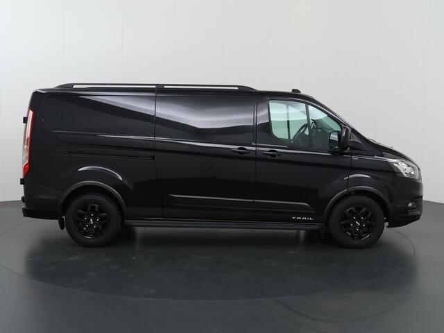 Ford TRANSIT CUSTOM 300 2.0 TDCI L2 H1 | TRAIL UITVOERING | LEDEREN BEKLEDING | NAVIGATIE | CAMERA | CRUISE CONTROL | TREKHAAK | LM VELGEN | TREEPLANKEN | NL AUTO