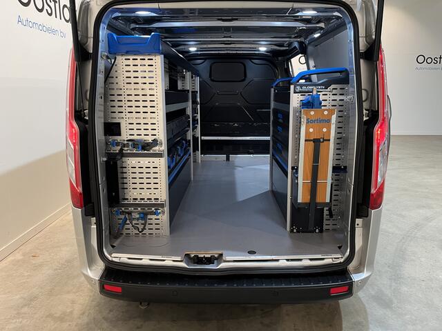 Ford TRANSIT CUSTOM 300 2.0 TDCI L2H1 Trend 130 PK Servicebus / Sortimo Inrichting / Euro 6 / Airco / Cruise Control / Klep / PDC / 3-Zits