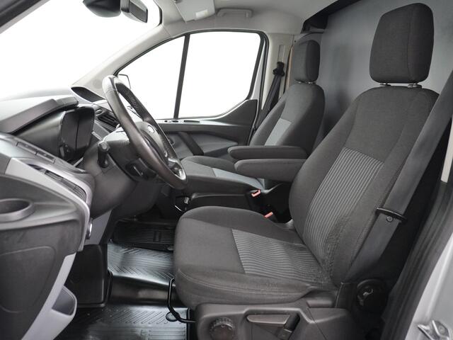 Ford TRANSIT CUSTOM Automaat 290 2.0TDCI 131PK L1H1 Navi Airco Cruise Camera Trekhaak Pdc Regen-/lichtsensor Euro 6 Trend Bluetooth Voorruit verwarmbaar Achterklep Zijschuifdeur Wandbetimmering Adaptieve bochtverl 1e Eigenaar Euro 6