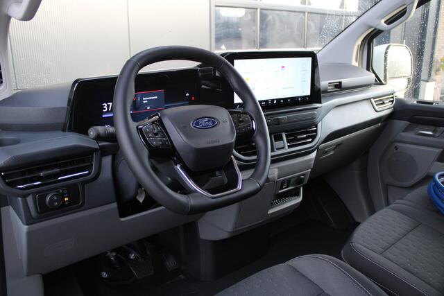 Ford TRANSIT CUSTOM E-Transit 340 L2H1 Limited 65 kWh 218pk - 2x Schuif - LED - 360 Camera - B&O - ACC - Navi - Stoel/Stuurverwarming - Rijklaar