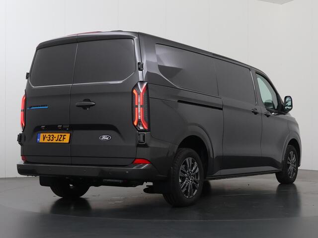 Ford TRANSIT CUSTOM e-Transit 340 | L2 H1 | LIMITED | 65 kWh | 218 PK | 328 KM WLTP | ADAPTIVE CRUISE | LED | STOELVERWARMING | PARKEERPAKKET | NAVIGATIE | 2-ZITS | LAADRUIMTE PAKKET | SNEL LADEN | CARPLAY / ANDROID AUTO | 2300 KG AHW