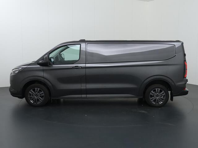 Ford TRANSIT CUSTOM e-Transit 340 | L2 H1 | LIMITED | 65 kWh | 218 PK | 328 KM WLTP | ADAPTIVE CRUISE | LED | STOELVERWARMING | PARKEERPAKKET | NAVIGATIE | 2-ZITS | LAADRUIMTE PAKKET | SNEL LADEN | CARPLAY / ANDROID AUTO | 2300 KG AHW