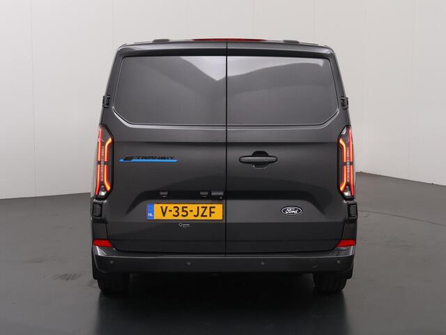 Ford TRANSIT CUSTOM e-Transit 340 | L2 H1 | Limited | 65 kWh | 218 PK | Cruise Control Adaptief | LM Velgen | 2-zits | Navigatie | Parkeercamera | Stoelverwarming | LED Koplampen | Snel-lader | Apple Carplay / Android Auto