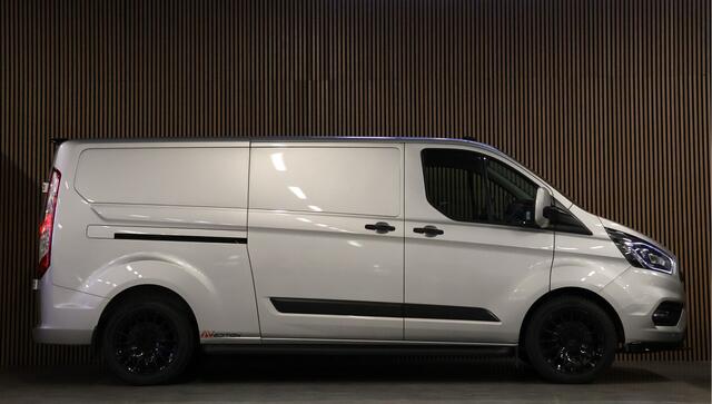 Ford TRANSIT CUSTOM 320 2.0 TDCI 170 PK L2H1 Raptor Edition | Bi-Xenon | CarPlay | ACC | Navigatie | Camera | Stoelverwarming | Dodehoek detector | DAB | Werkplaatsinrichting | 3-Zitter | Dealer onderhouden | Nieuwe APK