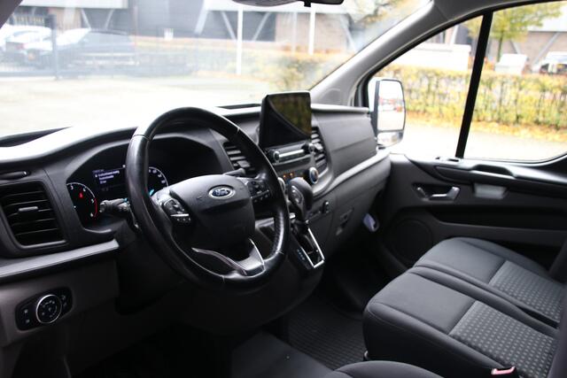 Ford TRANSIT CUSTOM 320 2.0 TDCI 170 PK L2H1 Raptor Edition | Bi-Xenon | CarPlay | ACC | Navigatie | Camera | Stoelverwarming | Dodehoek detector | DAB | Werkplaatsinrichting | 3-Zitter | Dealer onderhouden | Nieuwe APK