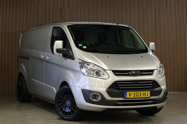 Ford TRANSIT CUSTOM 290 2.0 TDCI 170 PK L2H1 Limited | Standkachel | Navigatie | Stoelverwarming | Camera | Cruise control | Trekhaak | NAP Logisch | Dakdragers | Airco | 3-Zitter