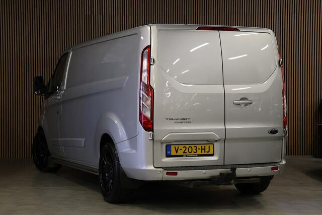 Ford TRANSIT CUSTOM 290 2.0 TDCI 170 PK L2H1 Limited | Standkachel | Navigatie | Stoelverwarming | Camera | Cruise control | Trekhaak | NAP Logisch | Dakdragers | Airco | 3-Zitter