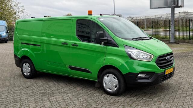 Ford TRANSIT CUSTOM 2.0 TDCI 77KW 105PK L2H1 EURO 6 AIRCO/ NAVIGATIE/ CRUISE CONTROL/ TREKHAAK/ 100% DEALERONDERHOUDEN