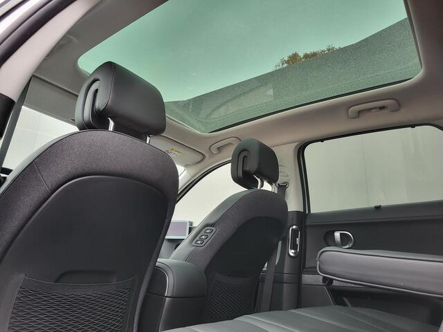 Hyundai IONIQ 5 Lounge AWD 77.4 kWh / 100% SOH / Origineel NL Auto / Panoramadak / Camera buitenspiegels / DAB / Bose audio / HUD / Navigatie / Stuur-, voorstoel- en achterbank verwarming / Stoelventilatie /