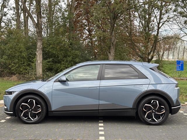 Hyundai IONIQ 5 Connect+ 77.4 kWh | Lederen bekleding | Warmtepomp & V2L | Geïntegreerde navigatie | Apple Carplay & Android Auto | Adaptieve Cruisecontrol | Camera | Warmtepomp | Stoel/-Stuur verwarming |